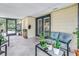 Outdoor patio with cozy seating provides a relaxing place to enjoy fresh air at 4821 S Gachet Blvd, Lakeland, FL 33813