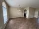 Dining room featuring wood floors, neutral walls, and ample natural light at 2163 Wintermere Pointe Dr, Winter Garden, FL 34787