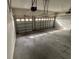 This garage has two bays, concrete floors, and garage door openers at 2163 Wintermere Pointe Dr, Winter Garden, FL 34787