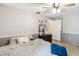 Bedroom with neutral paint, wood-look floors, and a ceiling fan at 25302 Lido Ave, Sorrento, FL 32776
