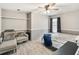Bedroom with wood-look floors, neutral paint, and a dark curtain at 25302 Lido Ave, Sorrento, FL 32776