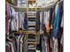 Walk-in closet with custom shelving and plenty of space for storage and organization at 25302 Lido Ave, Sorrento, FL 32776