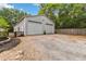 Spacious detached garage with two doors and ample parking space, offering plenty of storage at 25302 Lido Ave, Sorrento, FL 32776