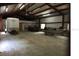 Spacious building that can be used as a garage or workshop with ample space for a boat, car, trailer or toys at 25302 Lido Ave, Sorrento, FL 32776