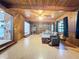 Open living room with wood accents, hardwood floors, and seamless flow to other areas at 2900 Cr 415, Lake Panasoffkee, FL 33538