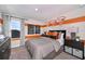 Bedroom with orange stripes, basketball hoops, and neutral furniture at 1748 Frogmore Ave, Haines City, FL 33844