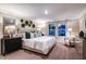 Serene primary bedroom featuring plush carpet, calm lighting, and a peaceful decor at 1748 Frogmore Ave, Haines City, FL 33844