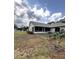 A spacious, partially fenced backyard, perfect for outdoor activities at 2528 Deerbrook Dr, Lakeland, FL 33811