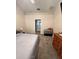 Bedroom offering carpet floors and view into the bathroom at 2528 Deerbrook Dr, Lakeland, FL 33811