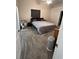 A well-lit bedroom boasts neutral walls and comfortable carpeting at 2528 Deerbrook Dr, Lakeland, FL 33811