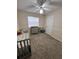 Comfortable carpeted room with neutral walls and a ceiling fan, perfect for relaxation at 2528 Deerbrook Dr, Lakeland, FL 33811