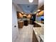 Charming kitchen with wood cabinets, granite counters, and stainless steel appliances at 2528 Deerbrook Dr, Lakeland, FL 33811