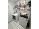Well-equipped laundry room with modern washer and dryer at 2528 Deerbrook Dr, Lakeland, FL 33811