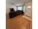 Spacious living room with wood floors and plenty of natural light at 2528 Deerbrook Dr, Lakeland, FL 33811