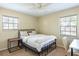 Cozy bedroom with natural light and light walls with light carpet at 3646 Palm Rd, Lakeland, FL 33810