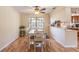 Bright dining area with hardwood floors and natural light at 3646 Palm Rd, Lakeland, FL 33810