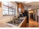 Well-lit kitchen with stainless steel appliances and tiled backsplash at 3646 Palm Rd, Lakeland, FL 33810