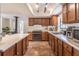 Traditional kitchen with abundant cabinetry, countertop space, and modern appliances at 3646 Palm Rd, Lakeland, FL 33810