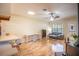 Living room showcasing hardwood floors, natural light, and cozy seating arrangement at 3646 Palm Rd, Lakeland, FL 33810