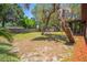 Landscaped yard features mature trees and greenery at 3646 Palm Rd, Lakeland, FL 33810