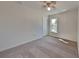Bedroom featuring neutral carpet, a ceiling fan, and a window providing great natural light at 4601 Glencrest Loop, St Cloud, FL 34772