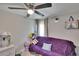 Bright bedroom featuring a ceiling fan, natural light, and a calming ambiance, perfect for rest and rejuvenation at 528 S Seminole Ave, Fort Meade, FL 33841