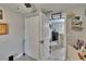Hallway view leading to a dining area, showcasing the home's layout and modern design at 528 S Seminole Ave, Fort Meade, FL 33841