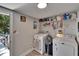 Functional laundry room with modern washer, dryer, and ample storage space at 528 S Seminole Ave, Fort Meade, FL 33841