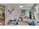 Cozy room featuring light wood floors, a ceiling light, and decorated walls at 528 S Seminole Ave, Fort Meade, FL 33841