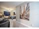 Cozy home hallway leading to the bedroom, complemented by sophisticated Parisian-themed decor at 1416 Leighton Ave, Lakeland, FL 33803