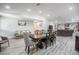Open-concept living space featuring hardwood flooring, lots of lighting, and neutral colors at 1416 Leighton Ave, Lakeland, FL 33803
