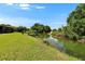 Enjoy a scenic waterway view from the backyard, providing a tranquil outdoor retreat at 1716 Bayou Cir, Lakeland, FL 33803