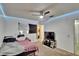 Bedroom featuring a ceiling fan, carpeted floor, and decorative LED lighting around the ceiling at 1716 Bayou Cir, Lakeland, FL 33803