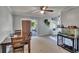 Dining room with table set, overlooking kitchen and outdoor patio at 1716 Bayou Cir, Lakeland, FL 33803