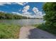 Scenic view of the lake showcasing natural beauty, with wading birds near the concrete boat ramp at 1716 Bayou Cir, Lakeland, FL 33803