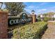 Charming entrance to the Colonnades, a 55 and older community, with well maintained landscaping at 4846 Colonnades Club Blvd, Lakeland, FL 33811