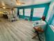 Open-concept living space with a dining area, and comfortable seating at 1618 Pineberry St, Lakeland, FL 33803