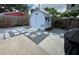 Backyard shed sits on gravel bed with paver stones for access at 1618 Pineberry St, Lakeland, FL 33803