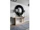 Inviting entryway featuring a decorative mirror, stylish lamps and sleek console table at 6236 Sw 95Th Pl, Ocala, FL 34476