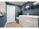 Well-equipped laundry room featuring modern appliances, ample storage and a sleek design at 6236 Sw 95Th Pl, Ocala, FL 34476