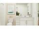 Well-lit bathroom featuring modern fixtures, a clean vanity, and stylish accents at 1133 Hour Glass Rd, Lakeland, FL 33801
