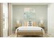 Inviting bedroom featuring a cozy bed with decorative pillows and matching nightstands at 1133 Hour Glass Rd, Lakeland, FL 33801