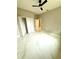 Well-lit bedroom featuring a closet, marble tile floors, neutral paint, and a modern ceiling fan at 209 W 6Th St, Lakeland, FL 33805