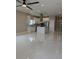 Open-concept living space featuring sleek, modern flooring, ample natural light, and contemporary fixtures at 209 W 6Th St, Lakeland, FL 33805