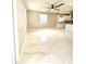 Open-concept living space featuring sleek, modern flooring, ample natural light, and contemporary fixtures at 209 W 6Th St, Lakeland, FL 33805