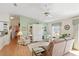 Inviting living room filled with natural light, a ceiling fan, and comfortable furniture at 2121 Escobar Ave, Lady Lake, FL 32159