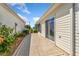Enclosed patio space that offers relaxation and privacy, surrounded by lush greenery at 2121 Escobar Ave, Lady Lake, FL 32159