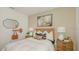 Comfortable bedroom showcasing stylish decor and a cozy bed at 2415 Slippery Rock St, Auburndale, FL 33823