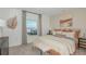 Stylishly decorated bedroom with ample natural light and modern decor at 2415 Slippery Rock St, Auburndale, FL 33823