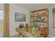 Comfortable home office space with modern shelving and natural light at 2415 Slippery Rock St, Auburndale, FL 33823